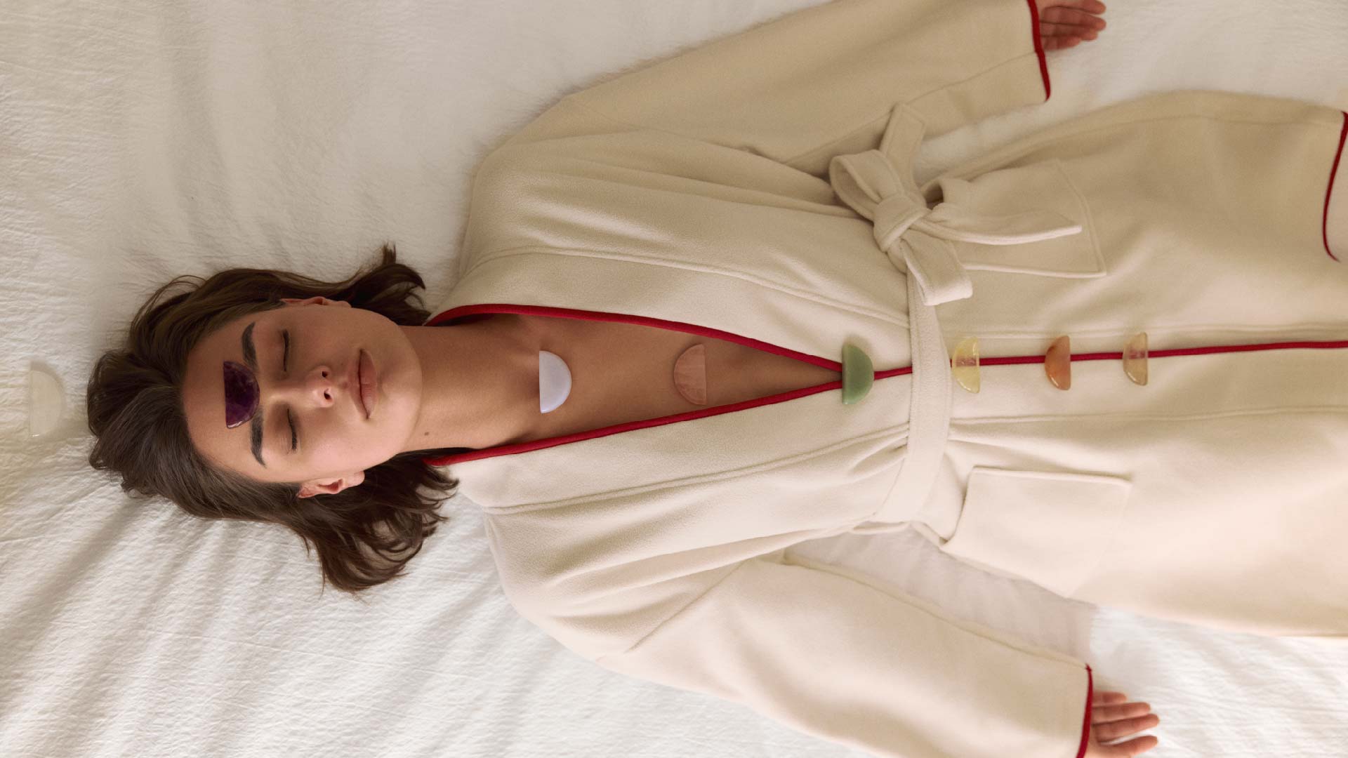 Orblink Full Body Chakra Balancing - Woman Lying with 7 Healing Stones for Complete Energy Alignment Ritual